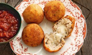 Green pesto and cheese Arancini